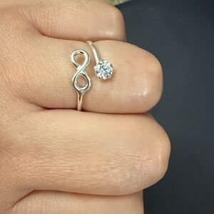 950 sterling silver infinity open ring with transparent stone Size 7